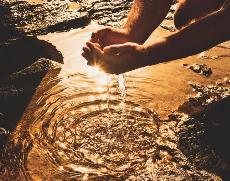 Water in the hands Stock Photos