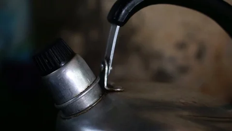 Water has boiled in a kettle removing white vapor. (Selective focus) Stock Footage 105947802