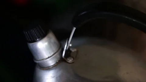 Water has boiled in a kettle removing white vapor. (Selective focus) Stock Footage 105947833