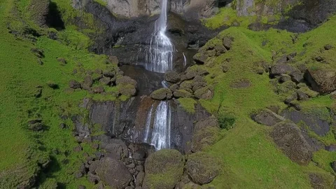 Water from the Hauifoss waterfall flows down the rocks. Andreev. Stock Footage 78550595