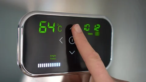 Water heating. Temperature up. Digital display Stock Footage 98830351
