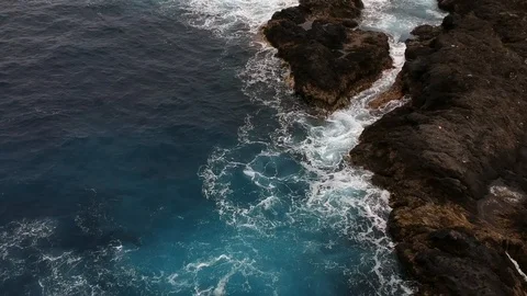 Water hitting the rocks from Above Video stock 88190836