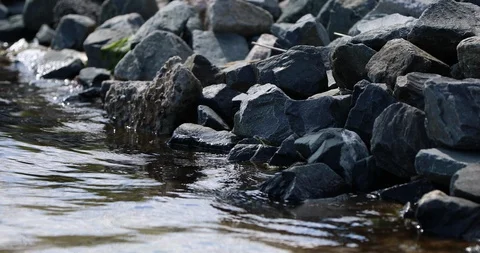 Water hitting rocks Stock Footage 127644598