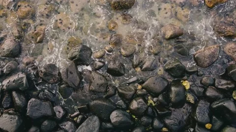Water hitting rocks Stock Footage 229848569