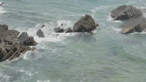 Water hitting rocks Stock Footage 323492225