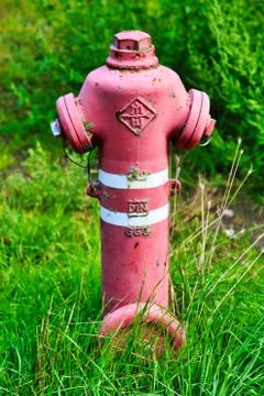 Water hydrant on the edge of a meadow Stock Photos