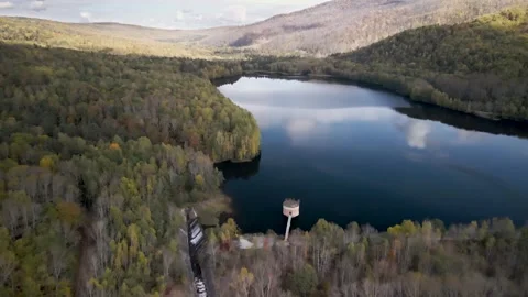 Water Intake Tower Surrounded by Autumn Forest 스톡 동영상 337227030