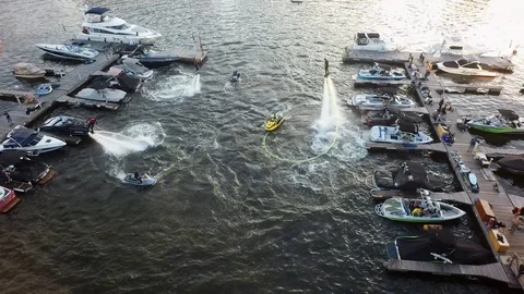 Water jet flyboarder performing Stock Footage 124624477