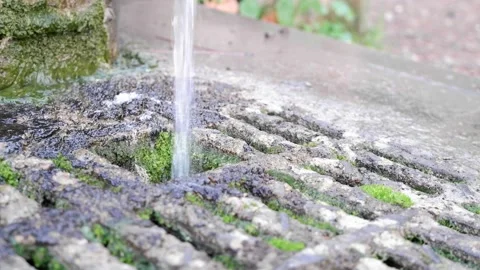 Water jet stream splash to the ground Stock Footage 168727568