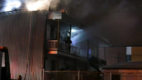 Water jet at structure fire Stock Footage 105297853