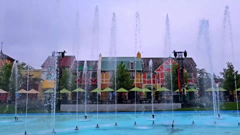 Water Jets in front of Shops in 4K Stock Footage 250106170