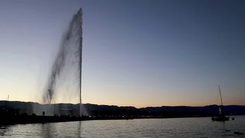 Water jets at sunset in Grenoble Stock Footage 76413488