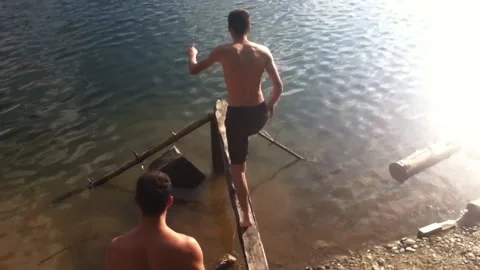 Water jump fail Stock Footage 273010514