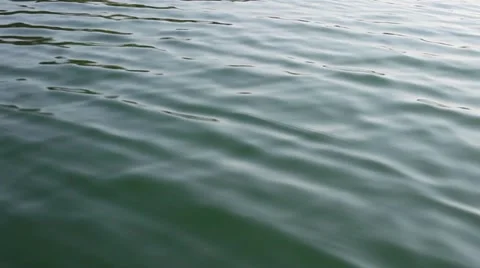 Water of a lake with more waves Stock Footage 11138841