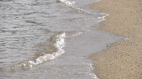 Water lapping on beach 스톡 동영상 23116122