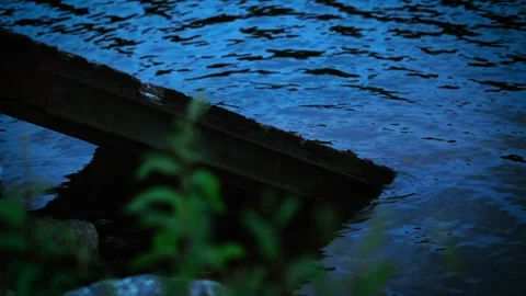 Water lapping at the dock at late evening Stock Footage 146917871