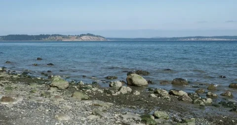 Water lapping of the rocky shore Stock Footage 143201488