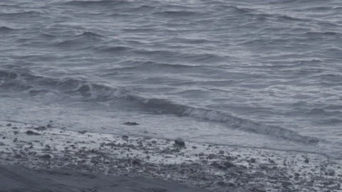 Water lapping onto shore 4 Stock Footage 147805961