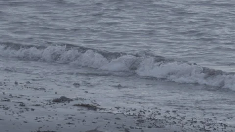 Water lapping onto shore 5 Stock Footage 147832205