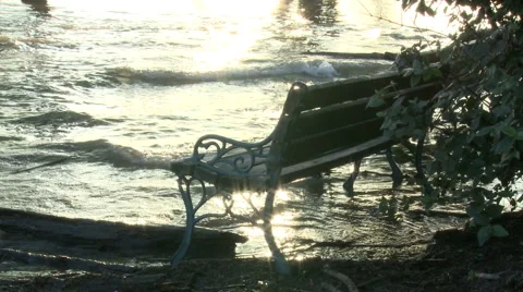 Water laps on bench Stock Footage 4958360