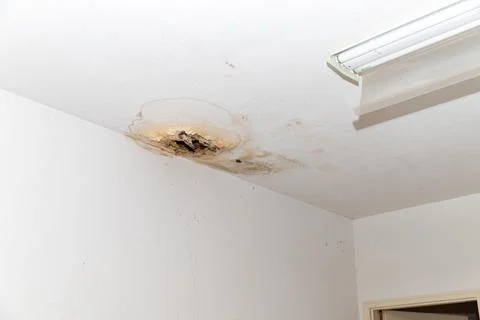 Water leak causing damage to ceiling Stock Photos