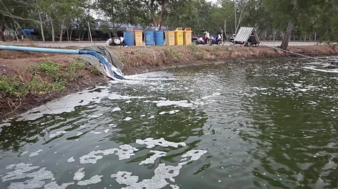 Water leak out from a pipe to artificial pond Stock Footage 56865005
