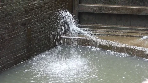 Water leaking from canal lock gate Stock-Footage 77537237