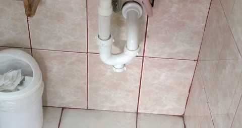 Water leaking from leaky pipes Stock Footage 130544897