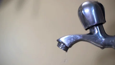 Water leaking from the tap, closeup Stock Footage 92474323