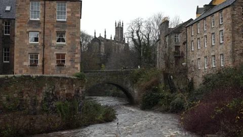 Water of Leith flowing through Dean Village in Edinburgh. Riverside Stock Footage 260221818
