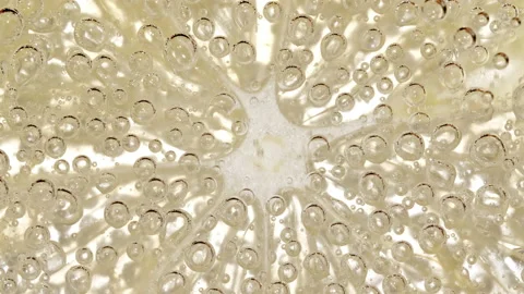 Water with Lemon Slices and exploding soda, air bubbles. Refreshing soft drink Stock Footage 182268142