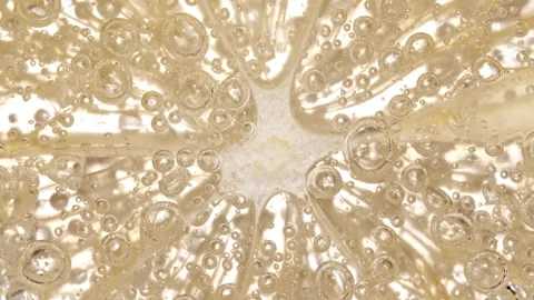 Water with Lemon Slices and exploding soda, air bubbles. Refreshing soft drink Stock Footage 197983410