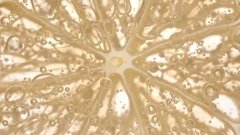 Water with Lemon Slices and exploding soda, air bubbles. Refreshing soft drink Stock Footage 198655569