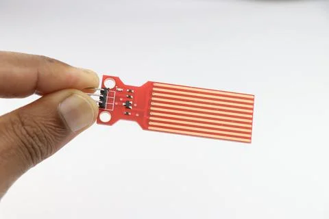 Water Level Depth Detection Sensor held in hand isolated on white background 写真素材