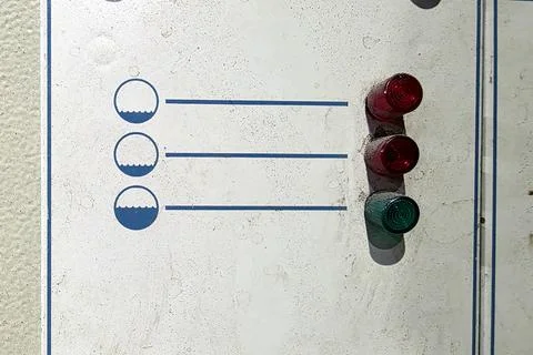 Water Level Indication Panel Showing Status With Colored Lights at a Facility Stock Photos