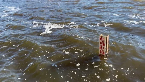 Water level indicator or scale used to measure the level of water Stock Footage 167300907