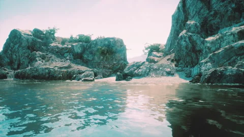 Water level to the steep coastal cliffs of the coast of the sea lagoon Video stock 233976531