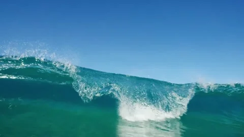 Water Level View of Blue Ocean Wave Breaking with Sea Spray and Foam 4K Video stock 332158746