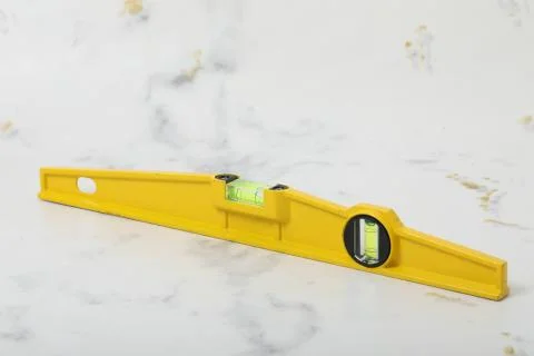 Water level yellow bubble tool for carpenter Stock Photos