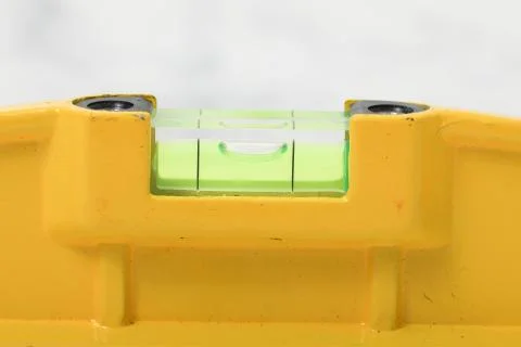 Water level yellow bubble tool for carpenter Stock Photos