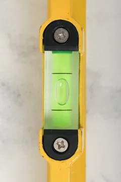 Water level yellow bubble tool for carpenter Stock Photos