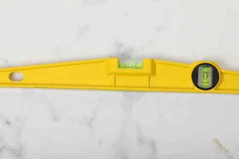 Water level yellow bubble tool for carpenter Stock Photos