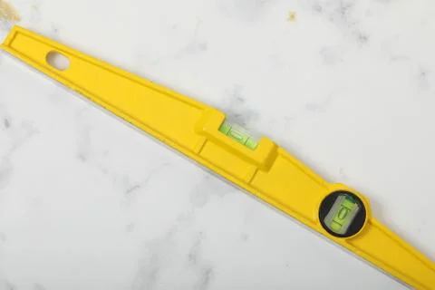 Water level yellow bubble tool for carpenter Stock Photos