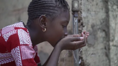 Water is Life for African Children Stock Footage