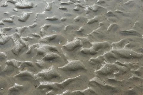 Water, light  and sand pattern Stock Photos