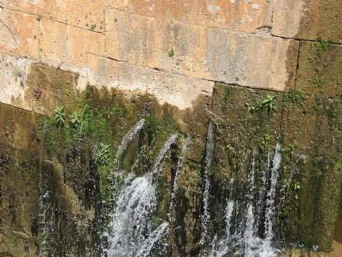 Water from lock wall Stock Photos