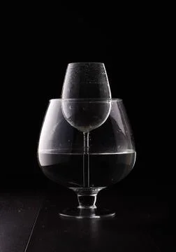 Water magnification physical phenomenon with wine glass Stock Photos