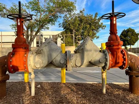 Water main pipe with back flow prevention and double block Stock Photos