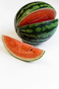 Water melon on a white table 스톡 사진