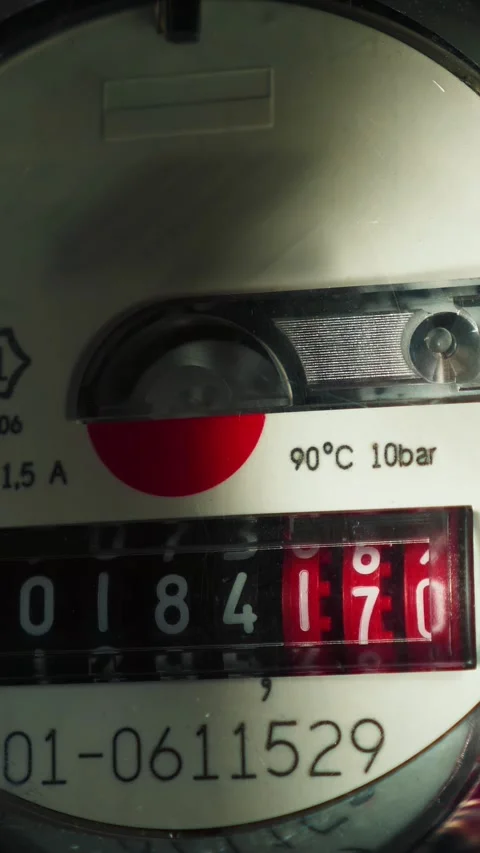 Water meter display showing volume of cubic liters. Vertical video Stock Footage 325380188